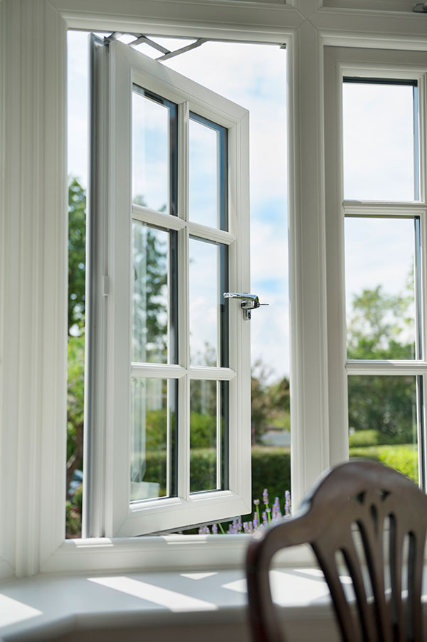 White uPVC casement windows installed on a modern home, offering energy efficiency and security.