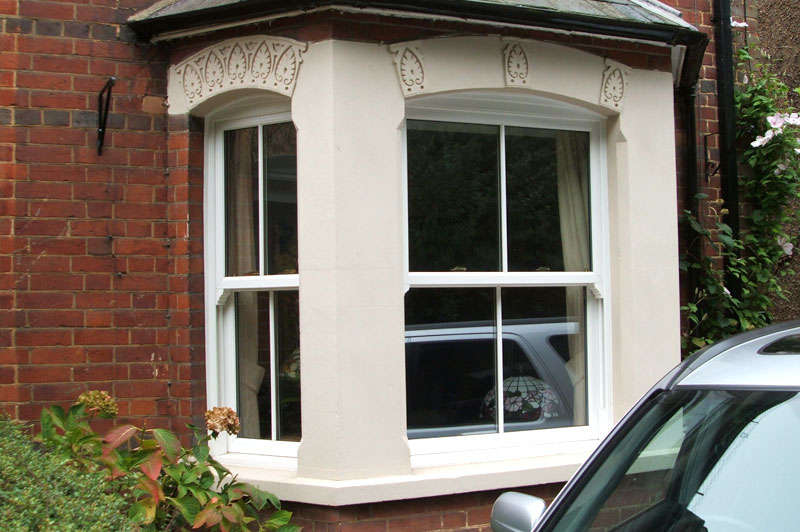 Abbey Windows Leicester upvc white pvc-u Vertical Sliding Sash windows with Georgian Bars